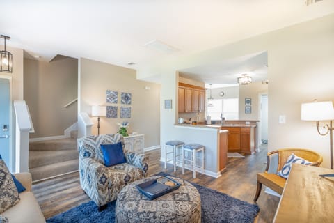 Living room,  kitchen. Half bath, dining and laundry room on first floor. 