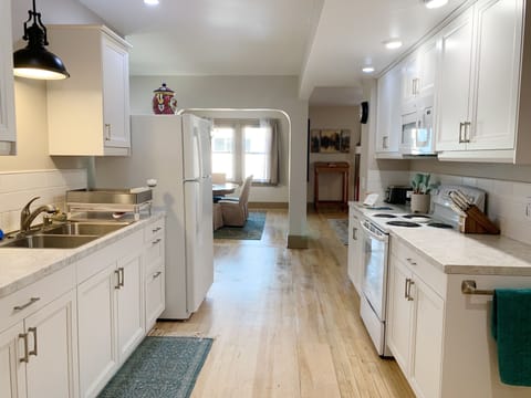Bright, modern, walk-through kitchen. 