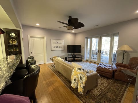 View of living room from bedroom door.