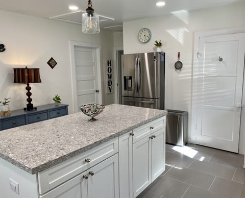 HUGE kitchen with barstools and every kitchen amenity you could ever imagine.