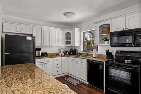 Step into our stylish kitchen, where modern meets elegance.