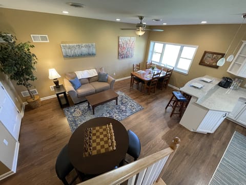 Game table is set for chess or checkers, or a good game of cards.