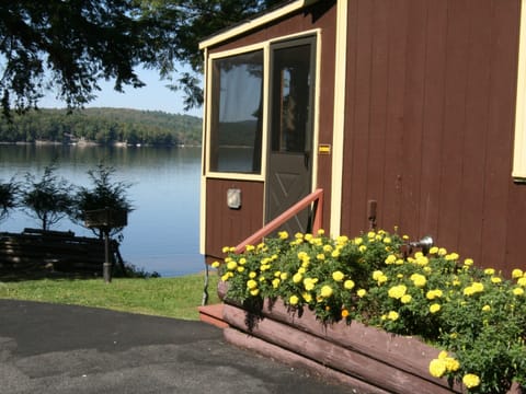 Nest Cottage entry porch overlooking lake