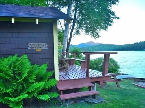 Retreat Cottage exterior view overlooking lake