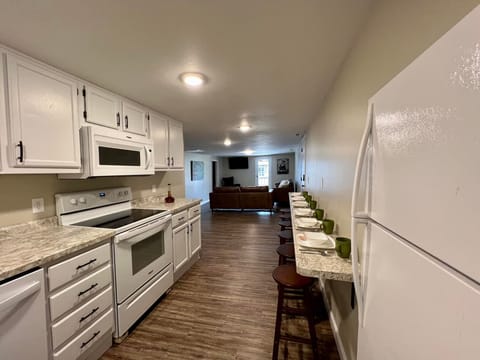 View of kitchen into living room