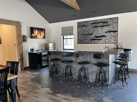 The bar, with a beverage cooler 