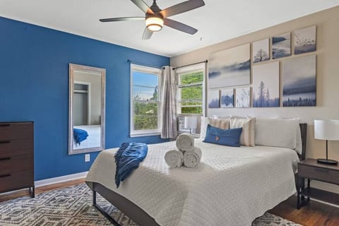 Queen bed, premium sheets, pillows, luxurious towels, nightstand with light, mirror