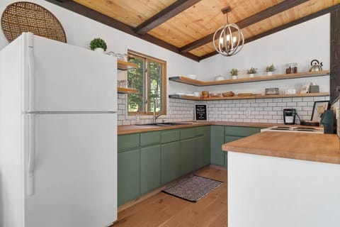 Off the living room is where our fully stocked kitchen is!