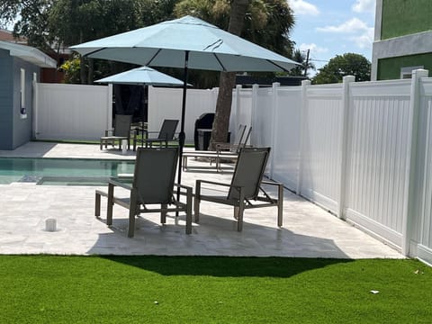 Relax by the pool - or walk less than 5 minutes to the beach!