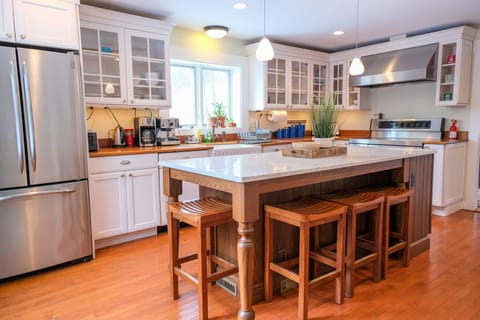 Updated kitchen with island and 4 seats