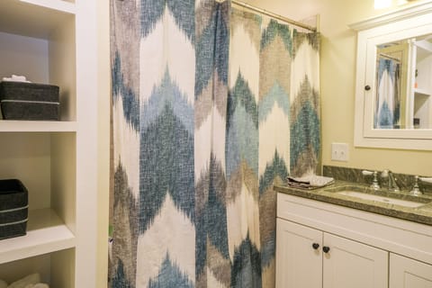 Full bathroom with shower/tub, radiant heated floors