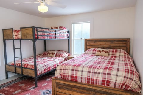 Queen bed with full/full bunk beds.  
