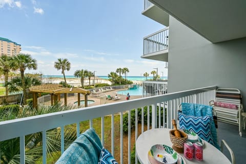 Welcome to Pelican Beach 215 - Beach Blessing! Soak up stunning beach views from your private balcony, perfectly positioned to watch the waves and palm trees sway.
