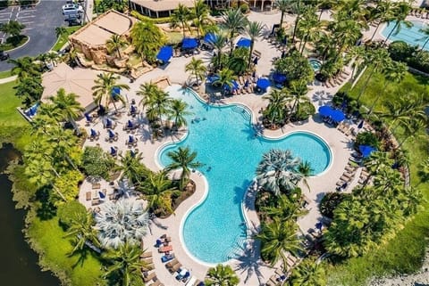 PAS5806 - The Paseo amenities include a clubhouse with a social room, fitness and covered seating area. Three gorgeous heated community pools, a theater, fitness, tennis, gym, restaurant, tiki bar, ice cream shop and coffee shop.