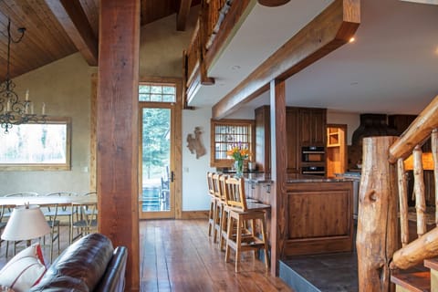 Kitchen opens into main living and dining space