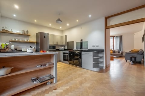 First floor: Kitchen looking through to the sitting room