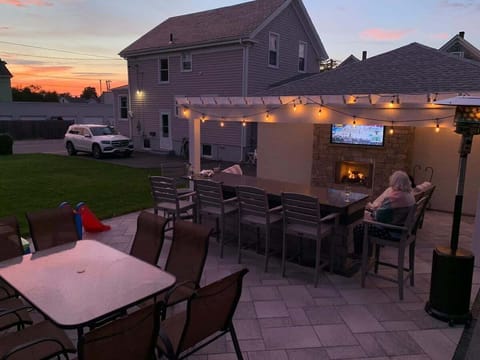 Table has been updates since this photo.  Double lot with great outdoor sitting, dinning and tv area.