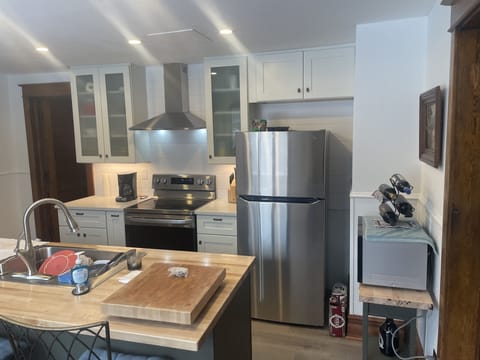 The Kitchen the oven has an air fryer option. Outside patio is Blackstone& grill