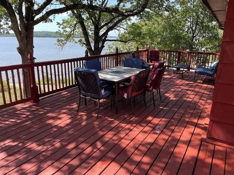 Erormous wraparound, elevated deck with shore front access to the lake.