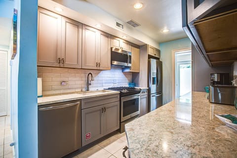 Prepare the perfect dinner with ease, thanks to the abundance of counter space available in the kitchen.