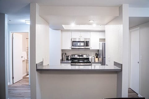 Have a few drinks at the kitchen bar while watching the designated chef in action.