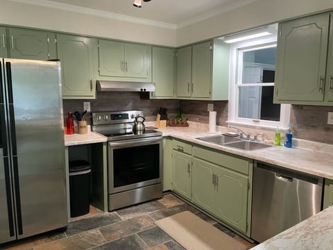 Fully stocked and open concept kitchen