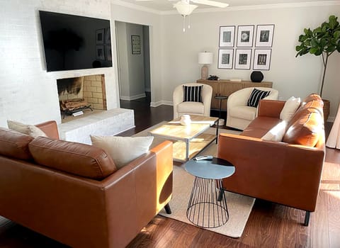 Living room that comfortably seats six. 65" T.V. 