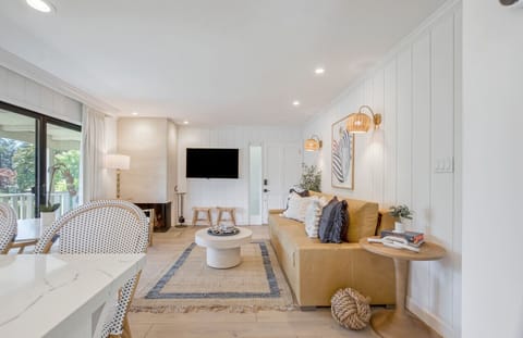 Take in the charming décor in the living-room/kitchen area