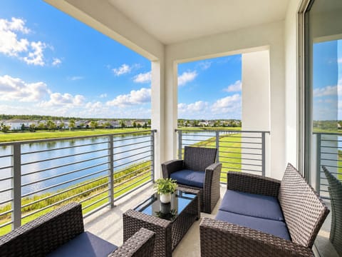 Private Balcony with Comfortable Seating and Scenic Lake Views
