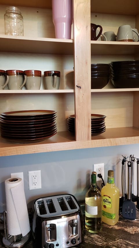 Fully stocked...  Times 2 kitchens! Dishes are not exciting!  Even with "!"