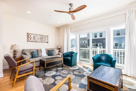 Find fun games in the coffee table on the "Beach House" sign side.