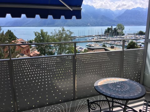 Balcony with panoramic views and 2 seating areas 