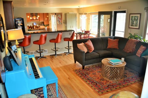 Welcome to our home. Get cozy in this sunny room.