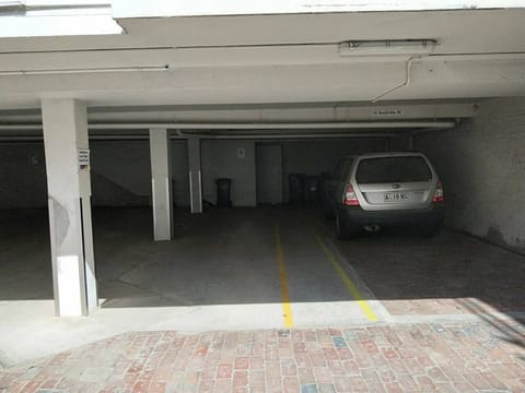 Secure off-street parking for two vehicles (one behind the other) is available underneath the townhouse. Please check the maximum vehicle height of 1.8 metres to ensure a perfect fit for your vehicles.