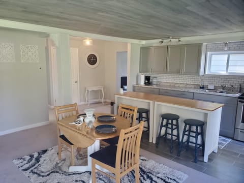 Looking toward kitchen and rear hallway toward den on the right