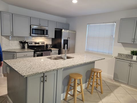 New granite countertops and backsplash