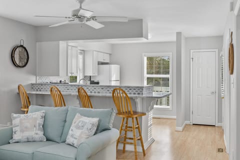 A view of the East Living Room into the East Kitchen