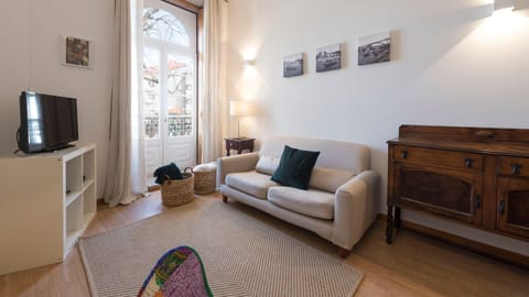Light living room with antique marks and a conextion to the balcony #airbnb #airbnbporto #portugal #pt #porto