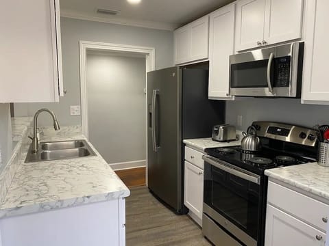 fully renovated kitchen with stainless appliances