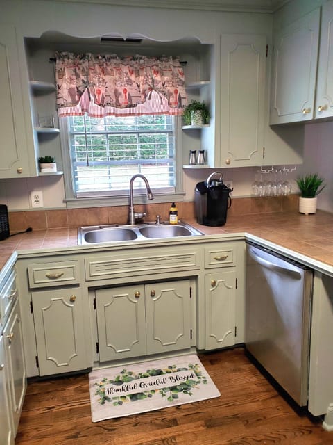 Kitchen facing sink.