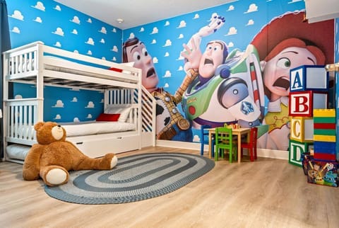 Bunk beds with their own little staircase make claiming the top spot half the fun.