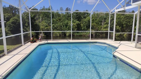 Private south and west facing pool overlooking the preserve and water.