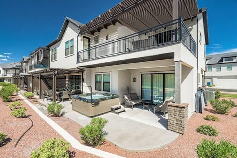 Gorgeous covered upper deck and lower patio with hot tub
