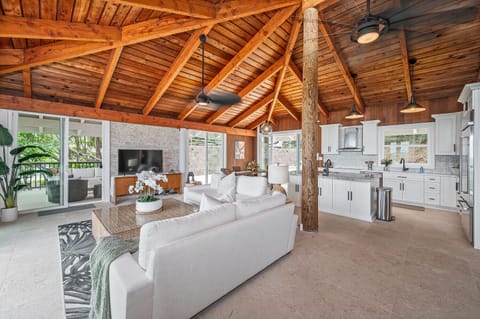 Spacious open-concept layout connects kitchen, dining, and living with ease.