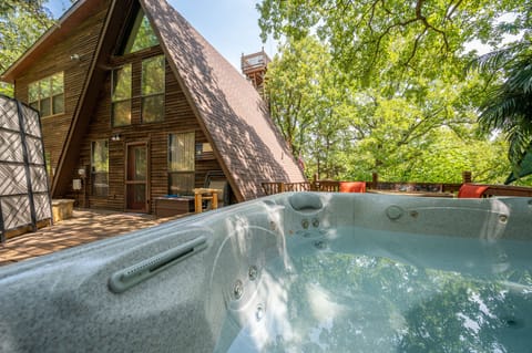 Our large hot tub is just waiting for you to come on in!