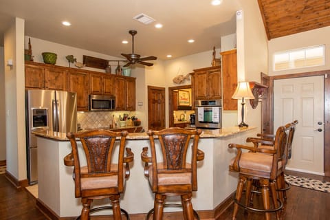 The kitchen has a breakfast bar for even more eating and entertaining options.