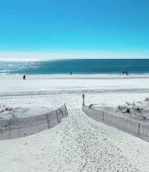 Beautiful sandy beaches just steps away. Private beach entrance. 