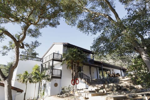 View of front of house from inside motor court. 
