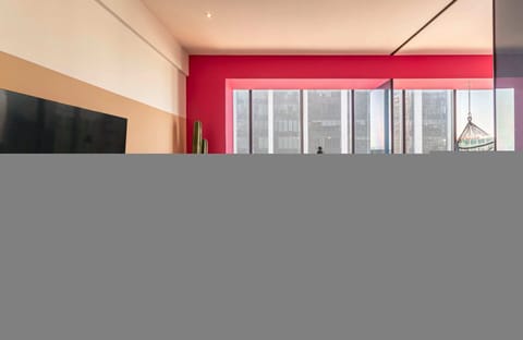 The building contains several similar units, Furniture, decor, and amenities may vary