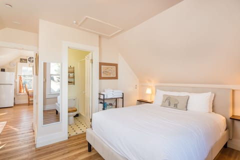 Queen bed and attached bathroom.